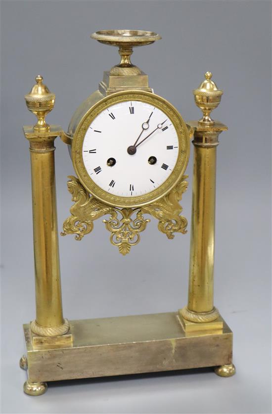 An ormolu portico clock with silk suspension, Louis XVI style H.38cm